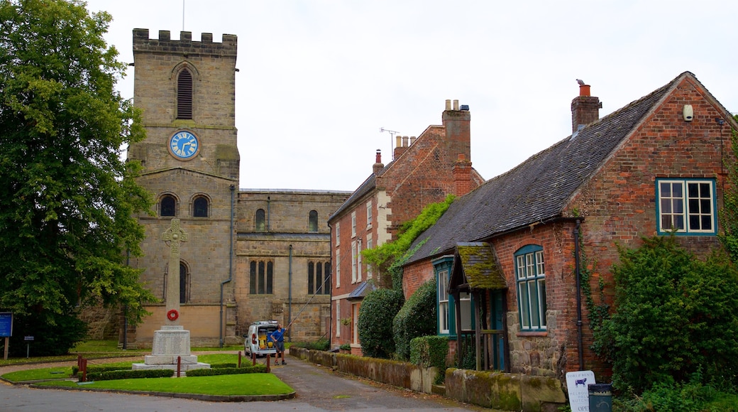 Melbourne Parish Church featuring a park and heritage architecture
