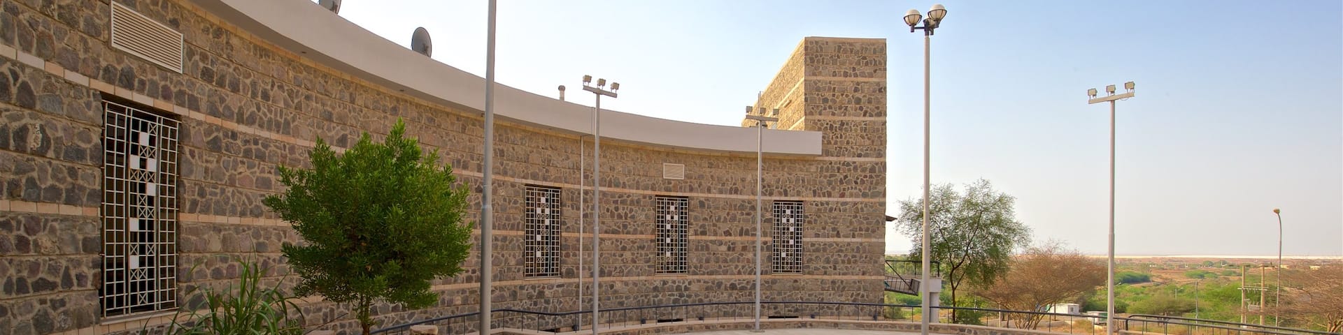 Gawr as-Safi showing a square or plaza and a sunset