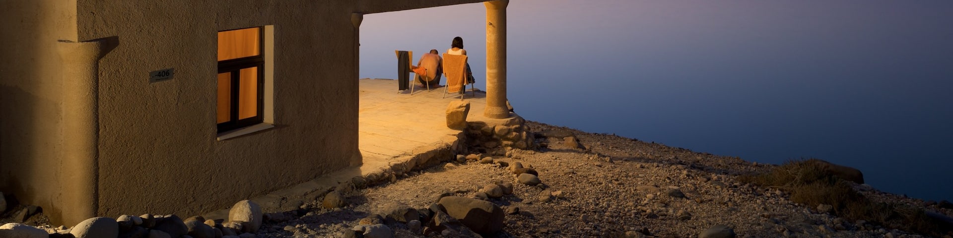 Mujib Nature Reserve which includes general coastal views, a house and a sunset