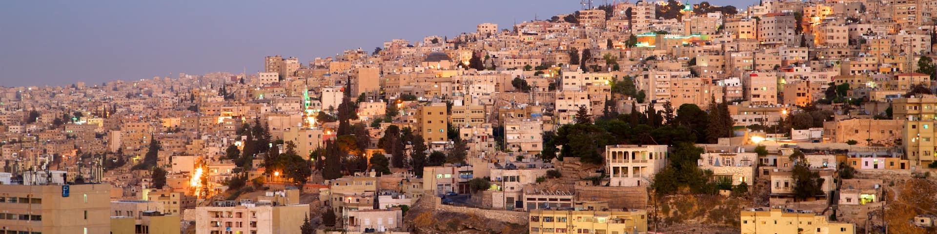 Amman featuring landscape views, a sunset and a city