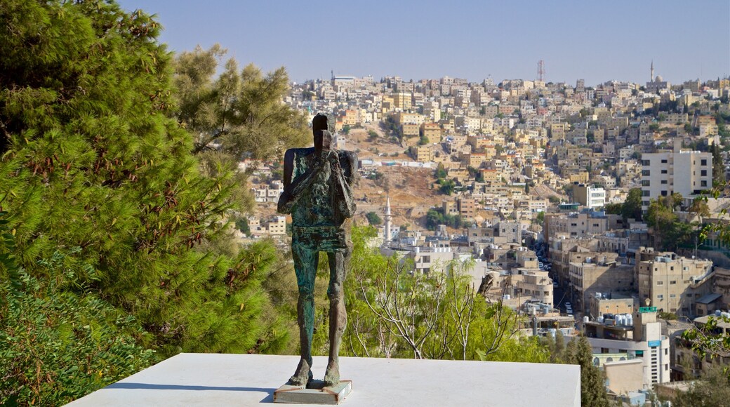 Darat al Funun showing outdoor art, a city and landscape views