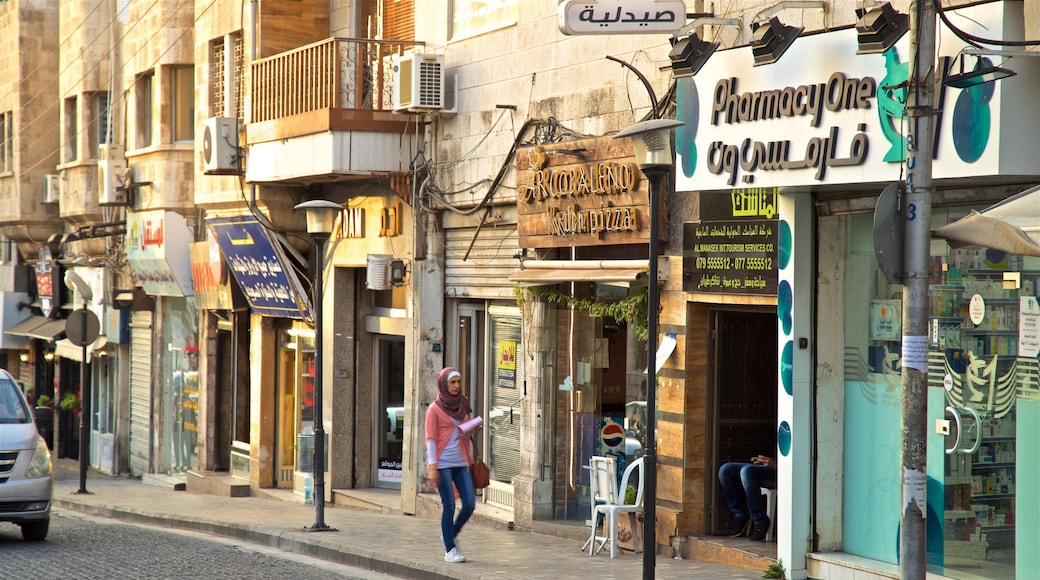 Rainbow Street featuring street scenes as well as an individual female