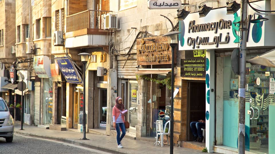 Rainbow Street showing street scenes as well as an individual female