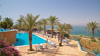 Sweimeh featuring a pool, general coastal views and swimming