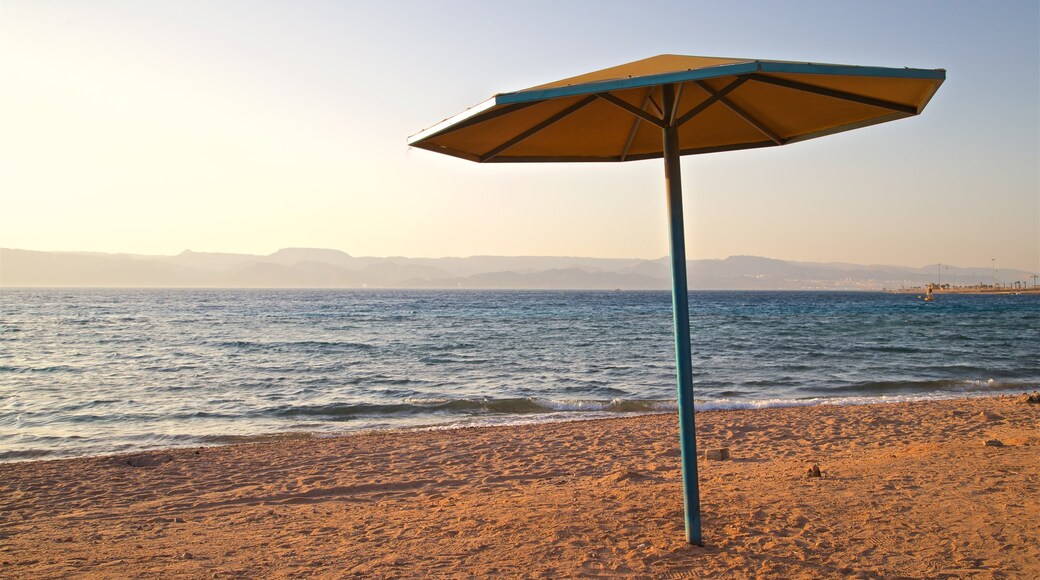 Aqaba which includes a sunset, general coastal views and a beach