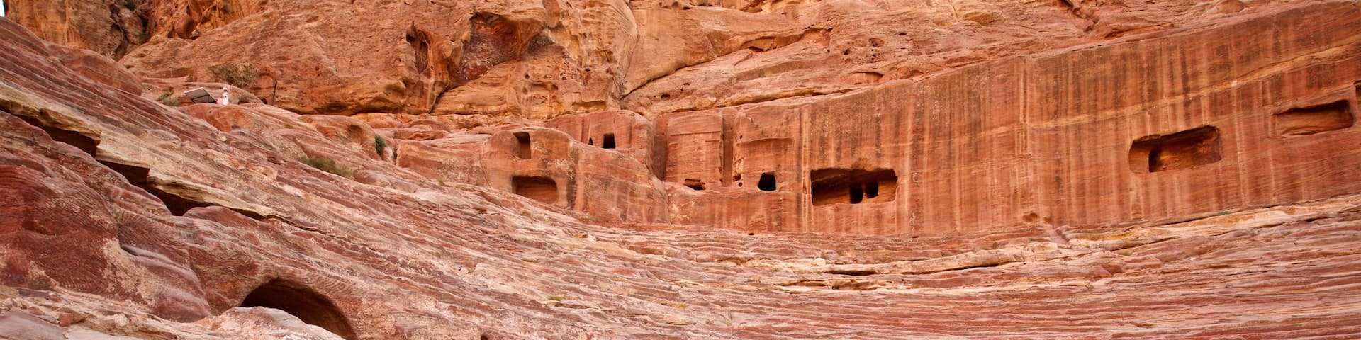 Nabatean Theater showing building ruins, a gorge or canyon and heritage elements
