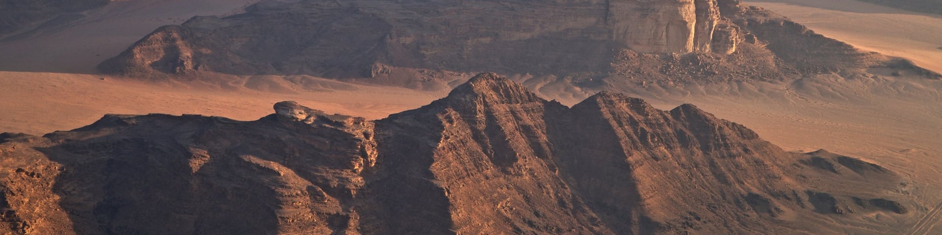 Wadi Rum featuring a gorge or canyon, landscape views and desert views