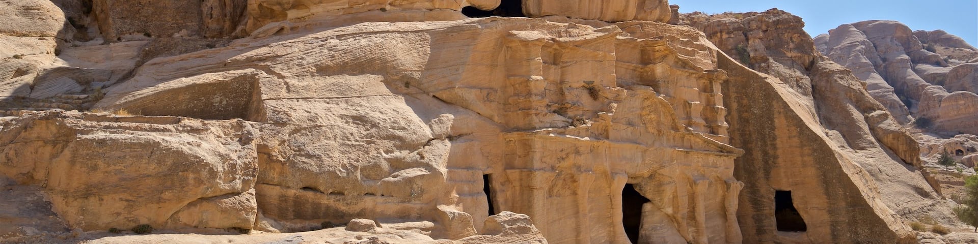 Obelisk Tomb featuring heritage elements and a gorge or canyon