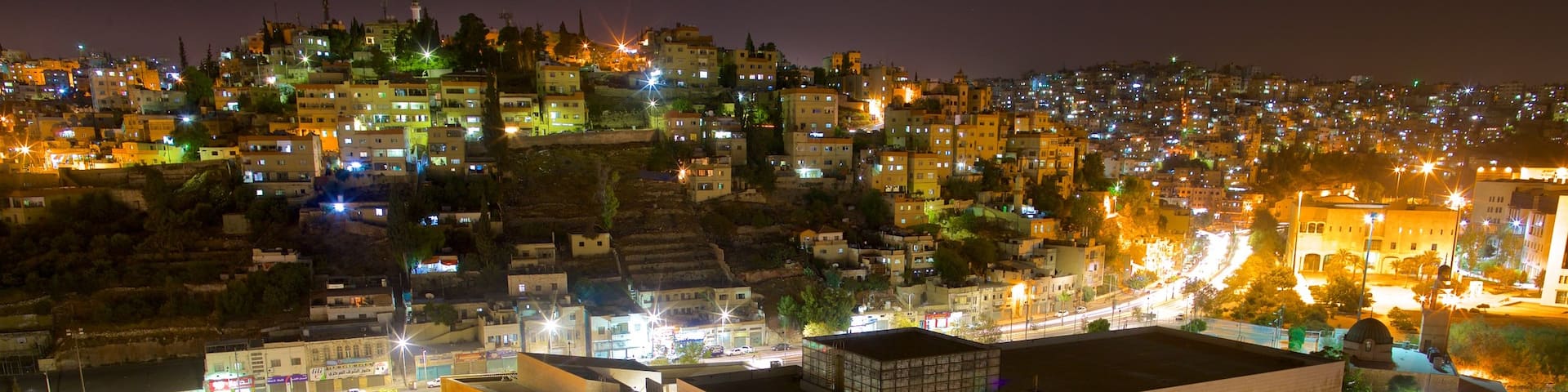Amman featuring a city, night scenes and landscape views