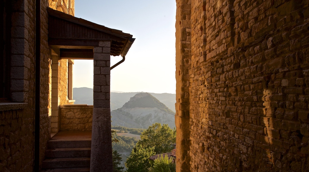 San Leo featuring tranquil scenes and a sunset