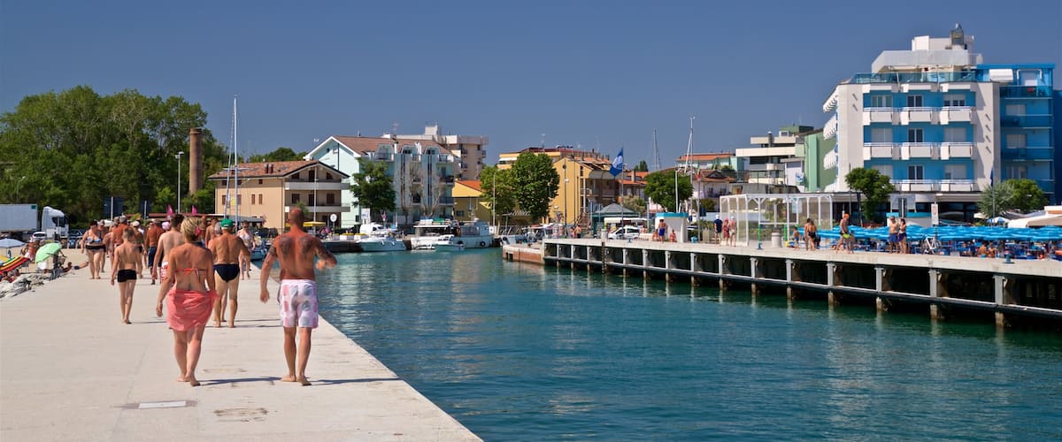Bellaria-Igea Marina showing a river or creek as well as a couple