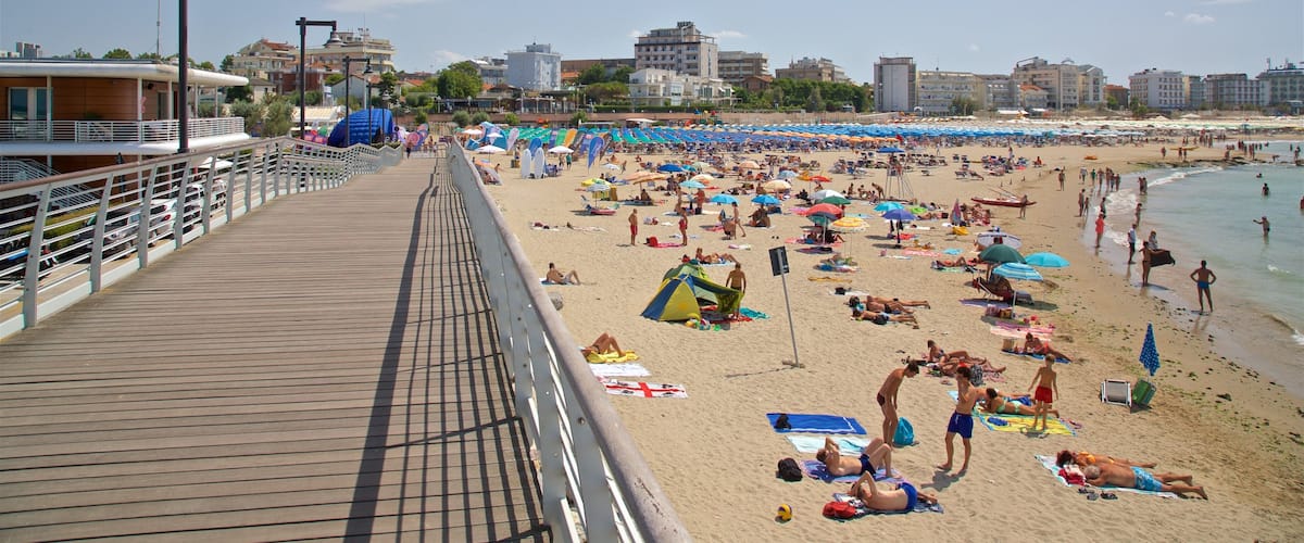 Cattolica showing a sandy beach, a bridge and general coastal views