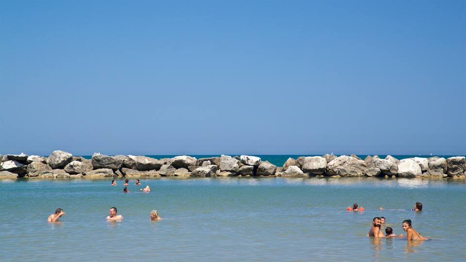 Viserbella showing a beach, general coastal views and swimming