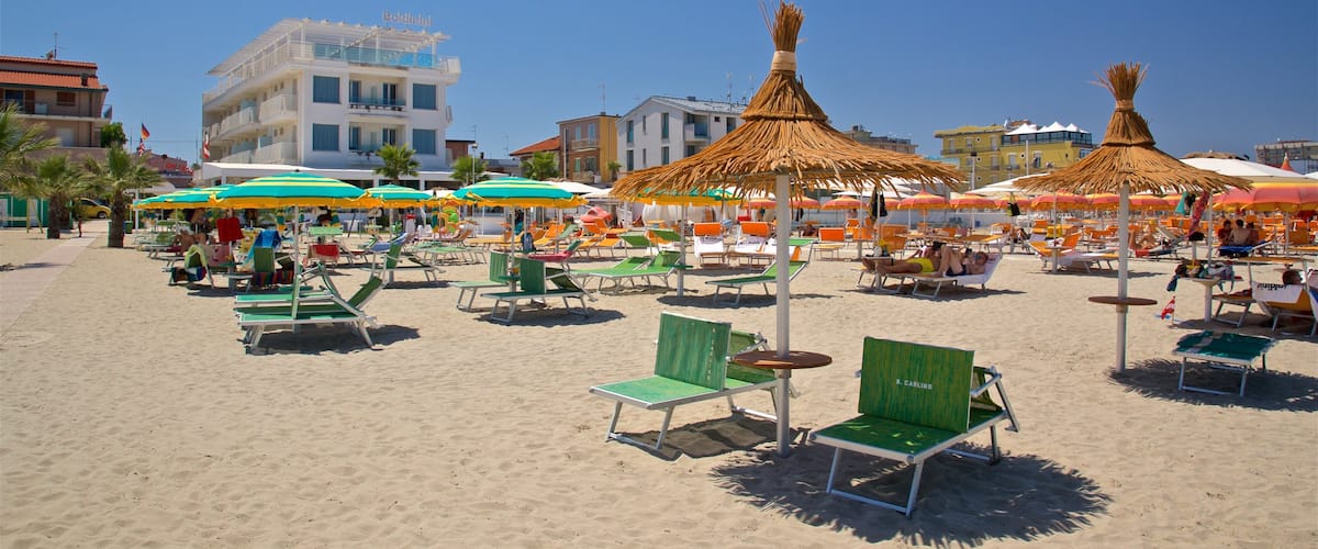 Torre Pedrera featuring a sandy beach, general coastal views and a coastal town