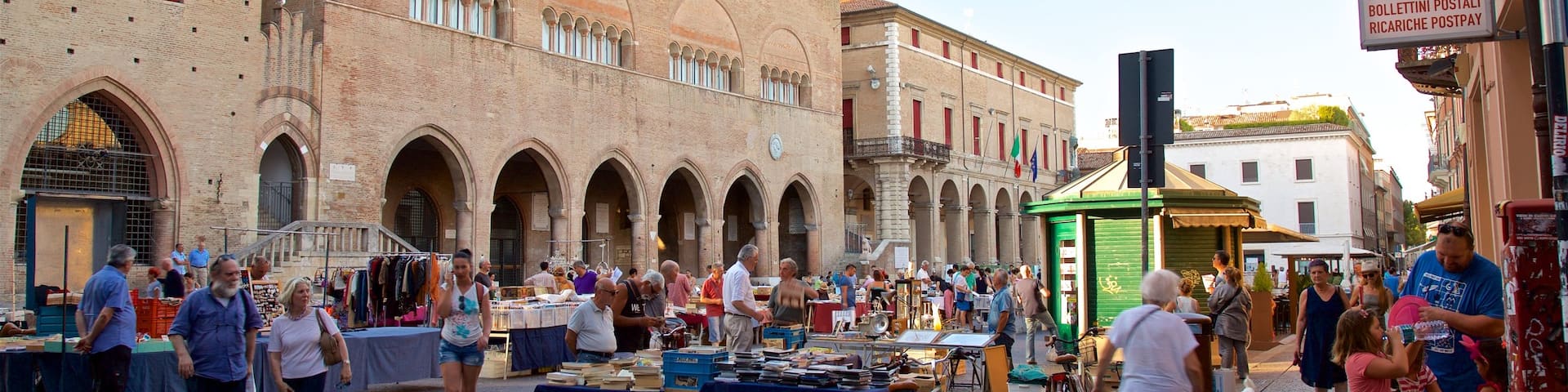 Piazza Cavour which includes markets, heritage architecture and street scenes