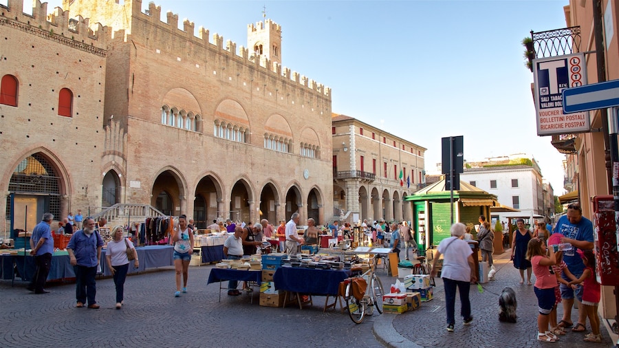 Piazza Cavour which includes markets, heritage architecture and street scenes