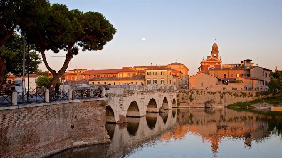 Tiberius Bridge which includes a river or creek, a bridge and a sunset