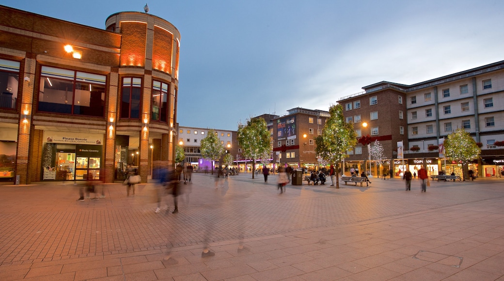 Coventry which includes night scenes and a square or plaza