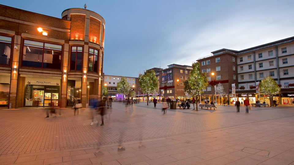 Coventry which includes night scenes and a square or plaza