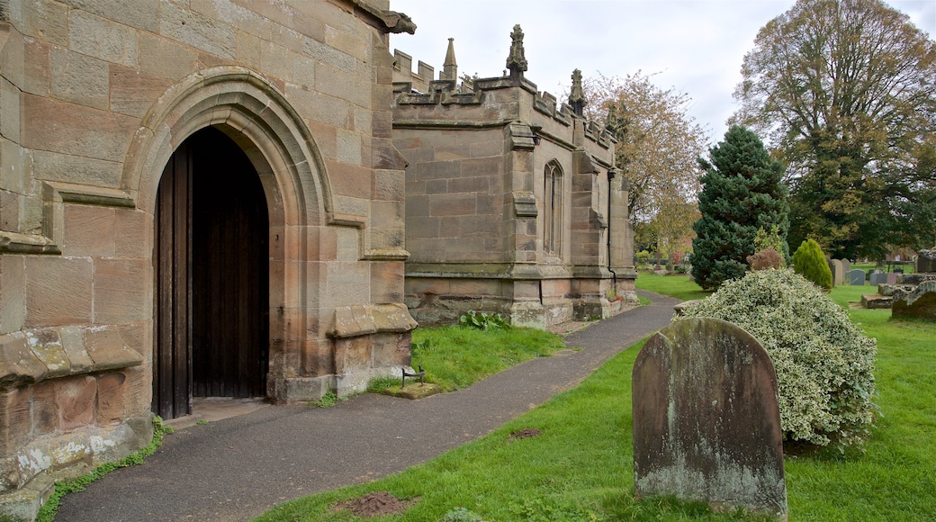 St. Bartholomews Church featuring a church or cathedral, heritage architecture and a cemetery