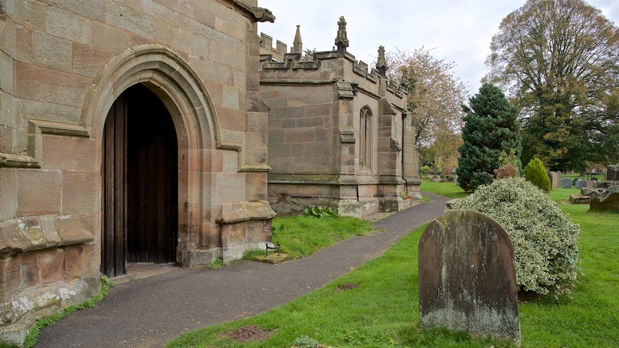 St. Bartholomews Church featuring a cemetery, a church or cathedral and heritage architecture