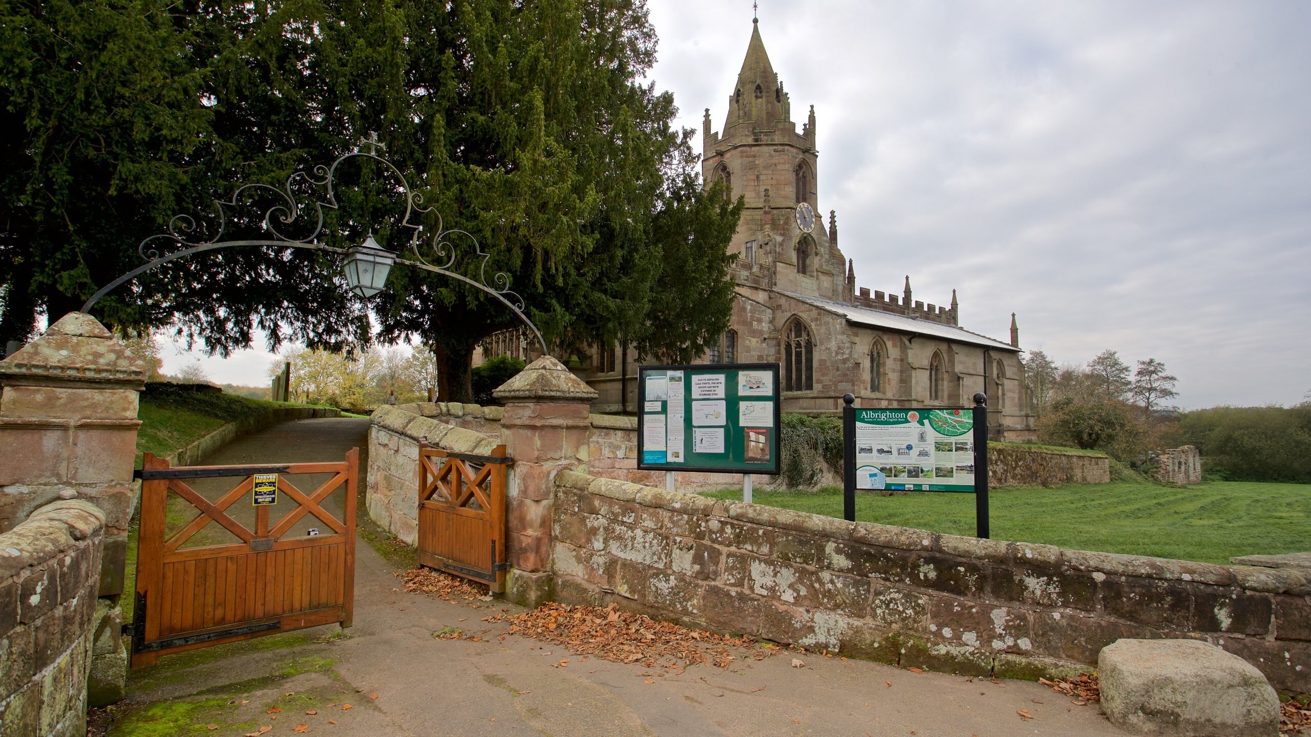 St. Bartholomews Church featuring signage, heritage architecture and a church or cathedral