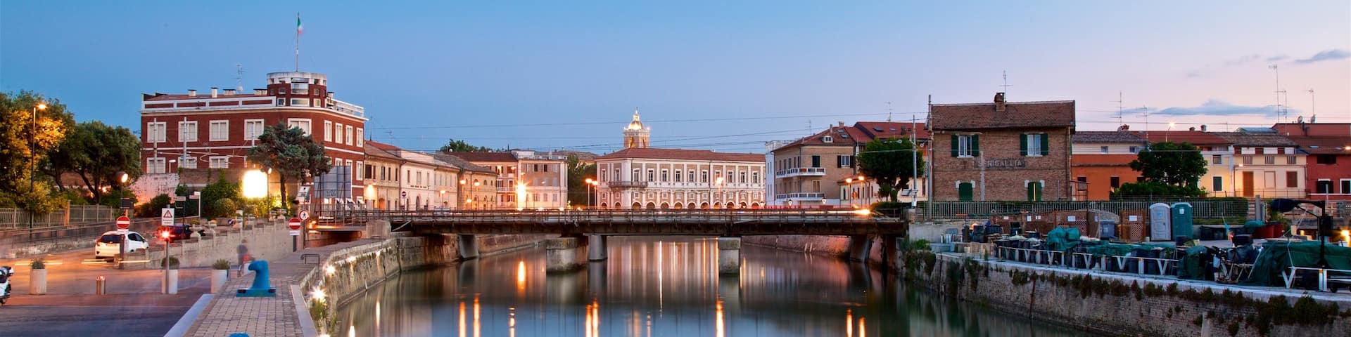 Senigallia featuring a bay or harbor and a sunset