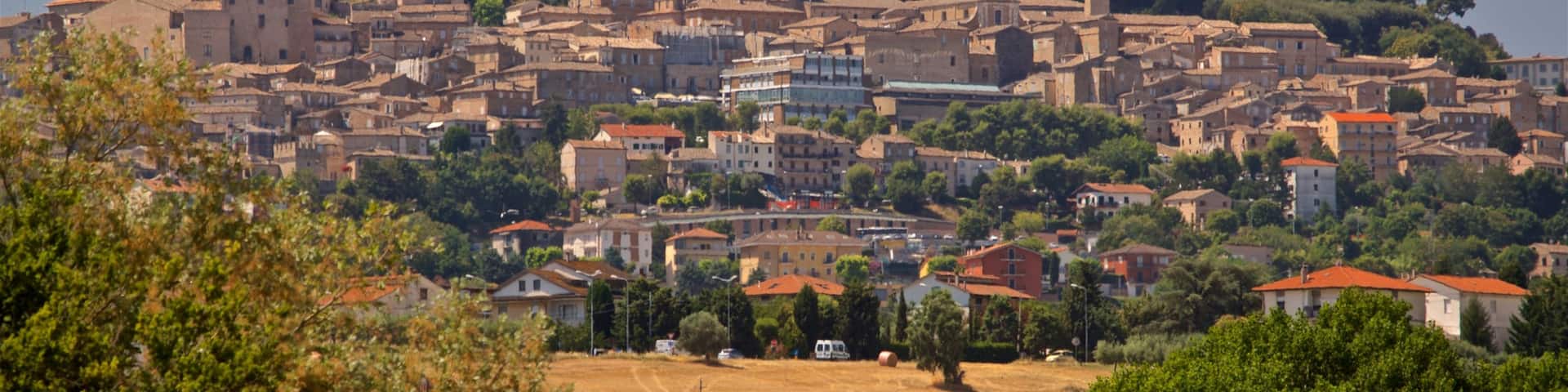 Fermo featuring landscape views, a city and farmland