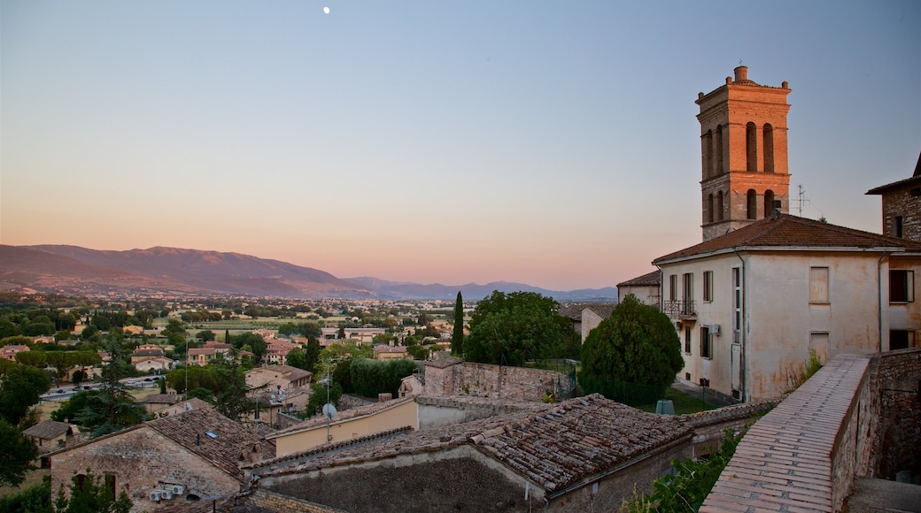 Spello featuring heritage elements, a city and a sunset