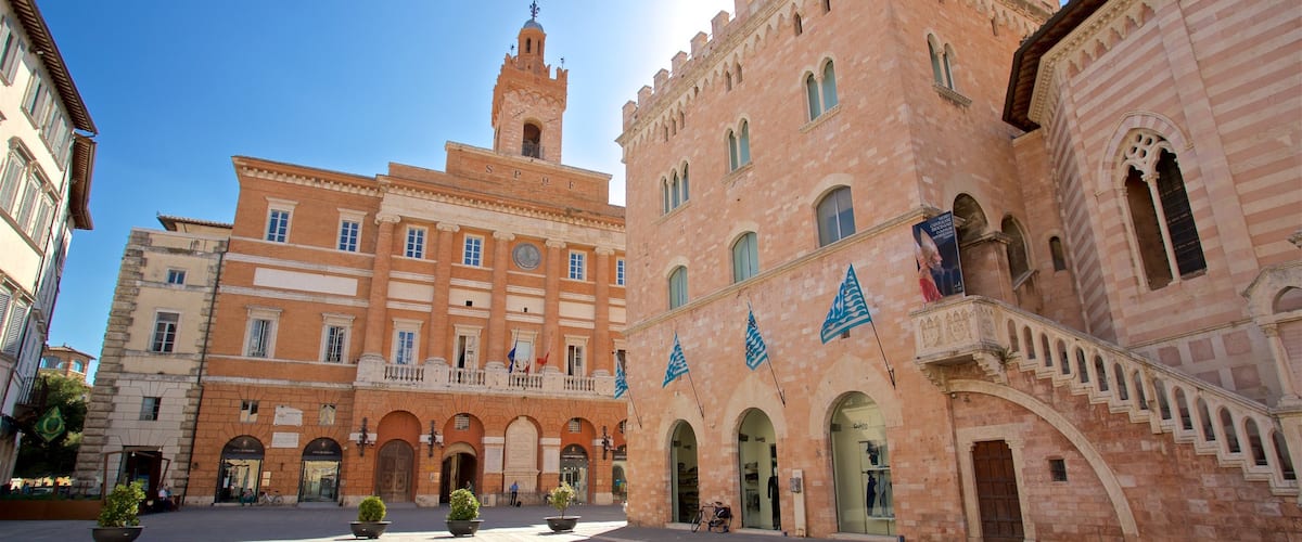 Foligno showing a sunset and heritage architecture