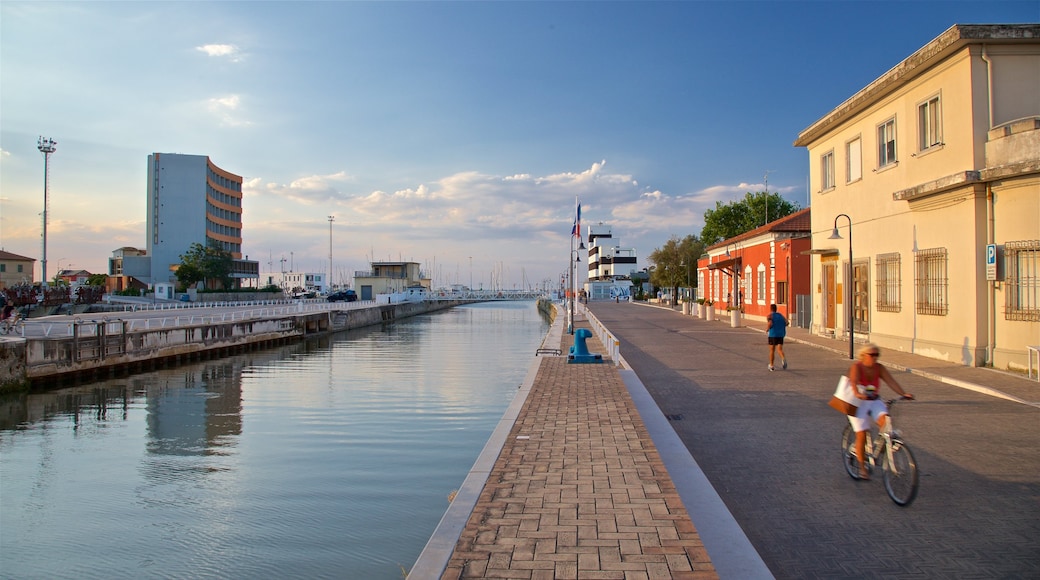 Senigallia which includes a sunset and a river or creek