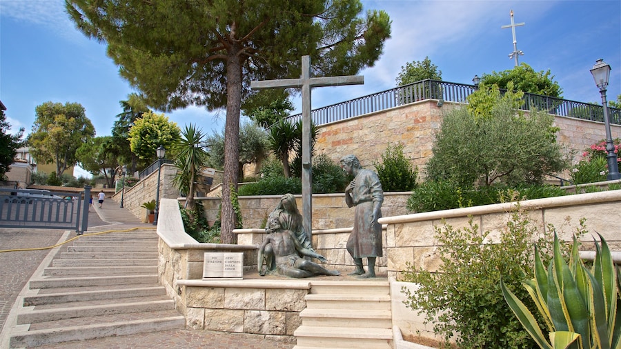 Dello Splendore Museum featuring a statue or sculpture, religious elements and a garden