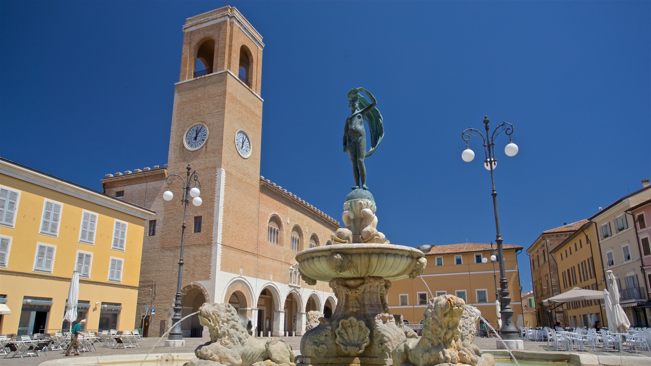 Fano which includes heritage architecture and a fountain