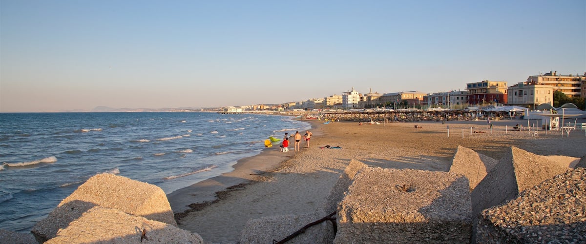 Senigallia showing a sunset, general coastal views and a coastal town