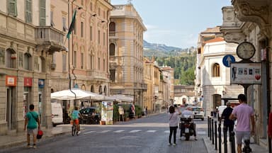 Ascoli Piceno showing a city and street scenes as well as a small group of people