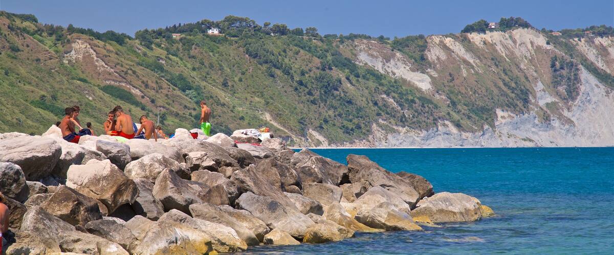 Portonovo featuring general coastal views and swimming as well as a small group of people