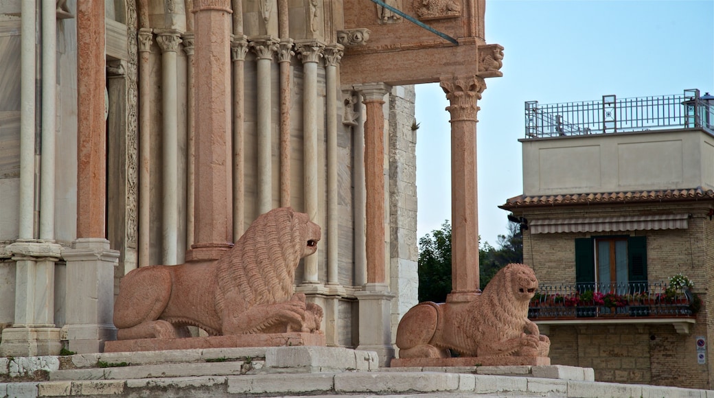 Cathedral of San Ciriaco which includes a statue or sculpture and heritage elements