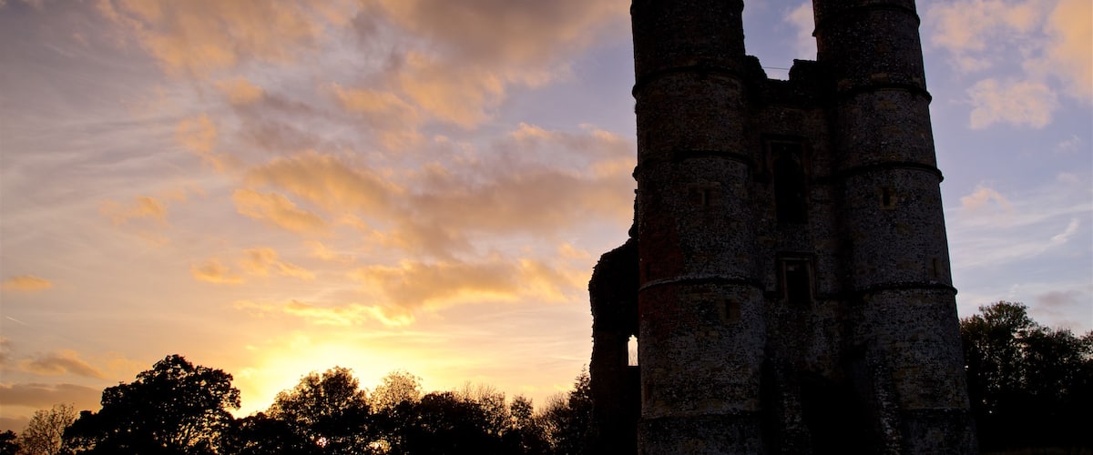 Donnington Castle featuring a sunset and heritage architecture