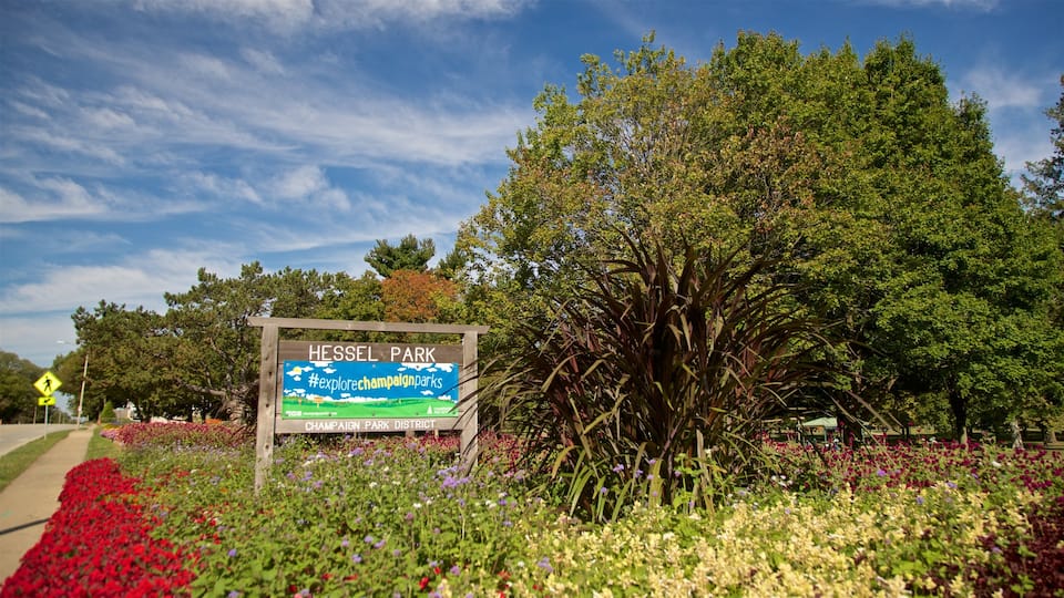 Hessel Park featuring signage, a garden and wild flowers