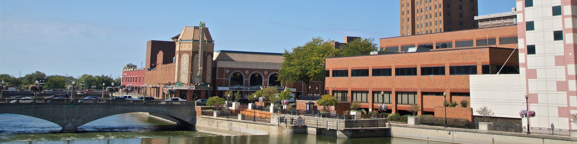 Aurora showing a river or creek and a city