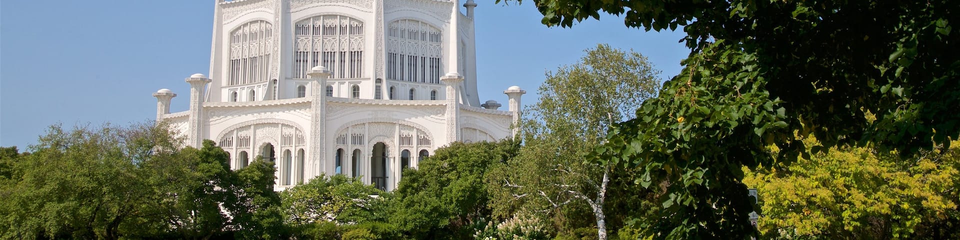 Baha\'i House of Worship showing heritage architecture and a garden