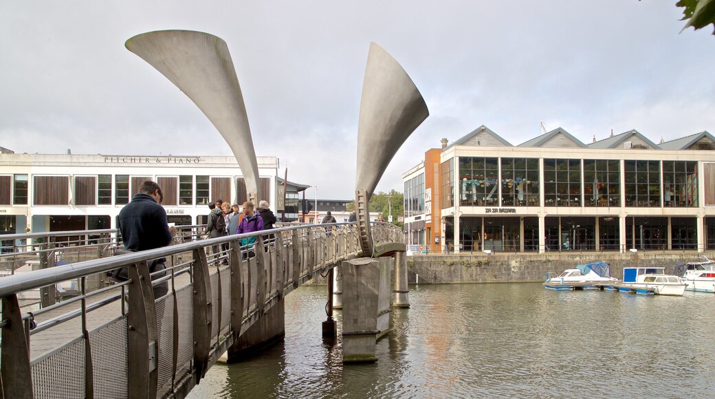 Bristol showing outdoor art, a river or creek and a bridge