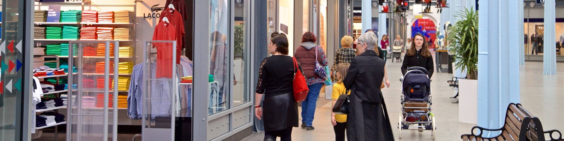 Swindon Designer Outlet which includes shopping and interior views as well as a small group of people