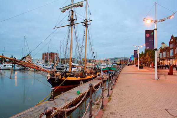 Hull Marina which includes night scenes, a bay or harbour and heritage elements