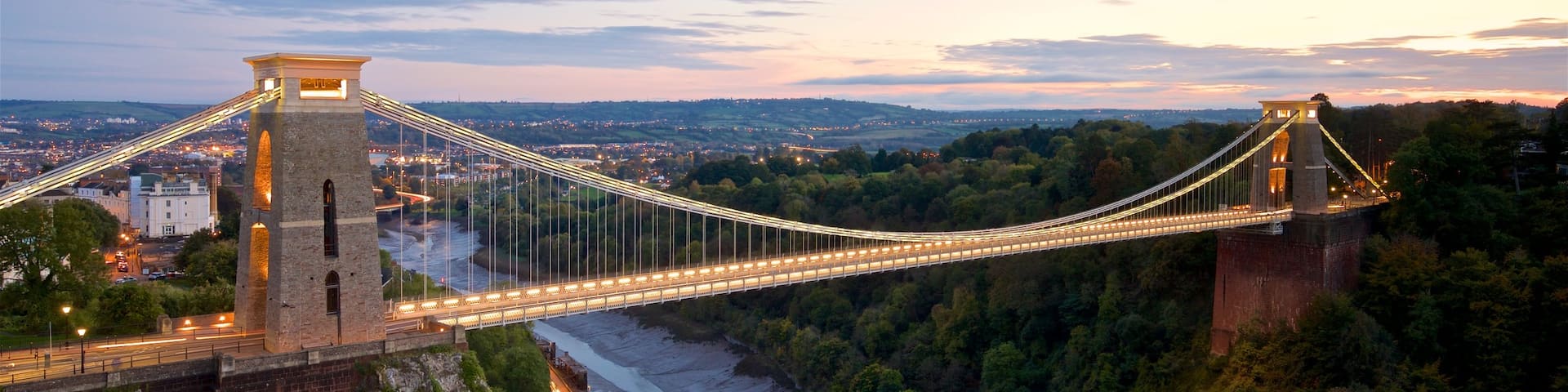 Clifton Suspension Bridge featuring a sunset, landscape views and a bridge
