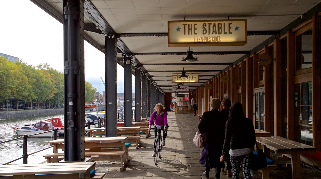 Watershed featuring cycling and signage as well as an individual female