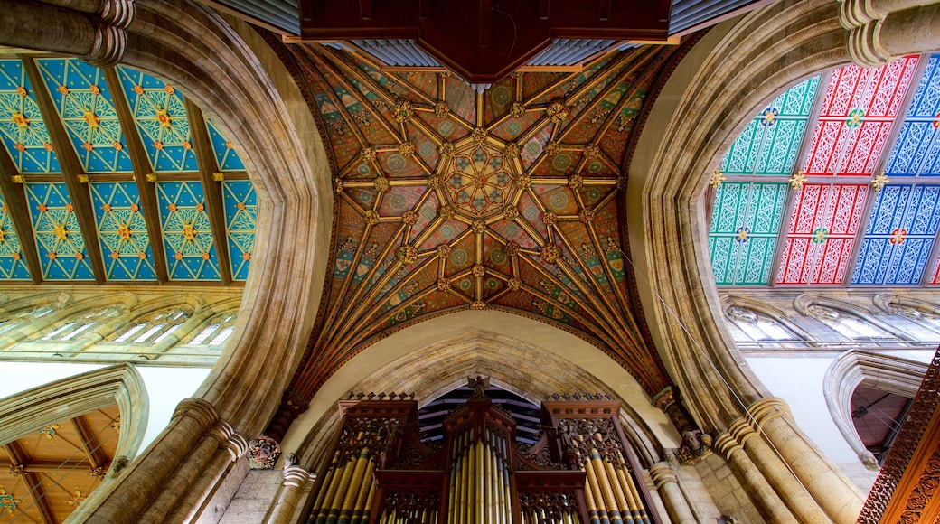 Holy Trinity Church showing a church or cathedral, heritage elements and interior views