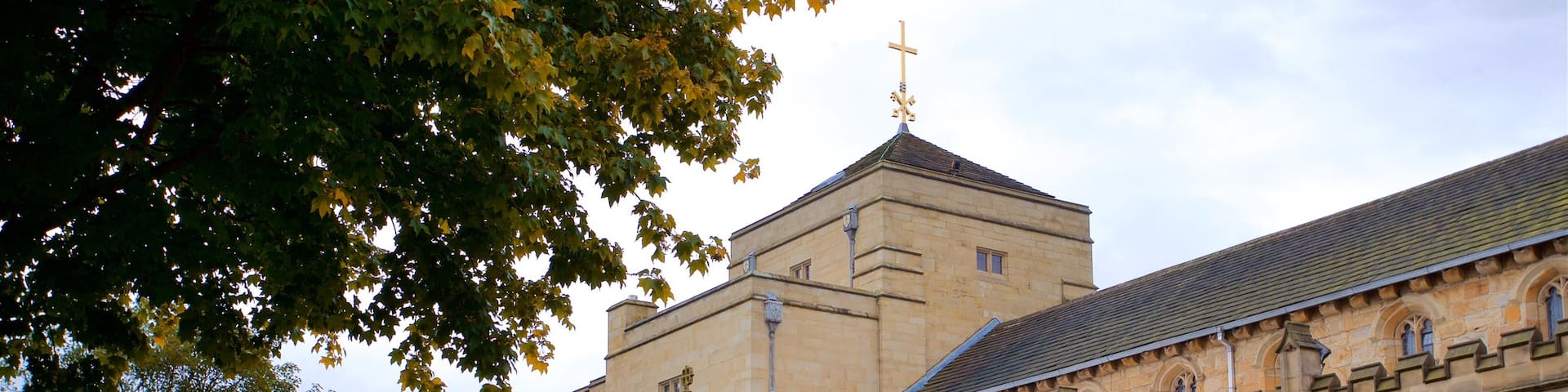 Bradford Cathedral which includes a park and heritage architecture