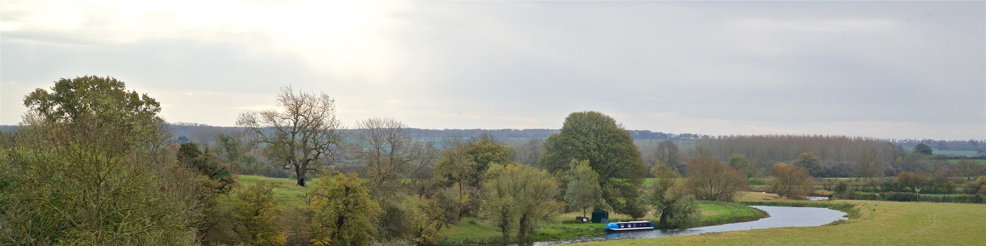 Fotheringhay Castle showing landscape views, tranquil scenes and a river or creek