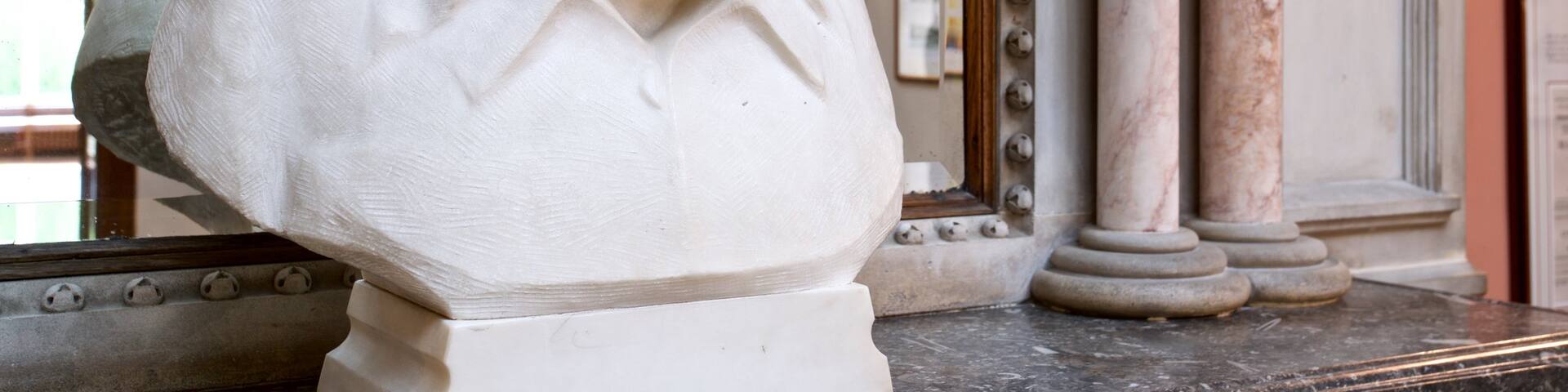 Bletchley Park featuring interior views and a statue or sculpture